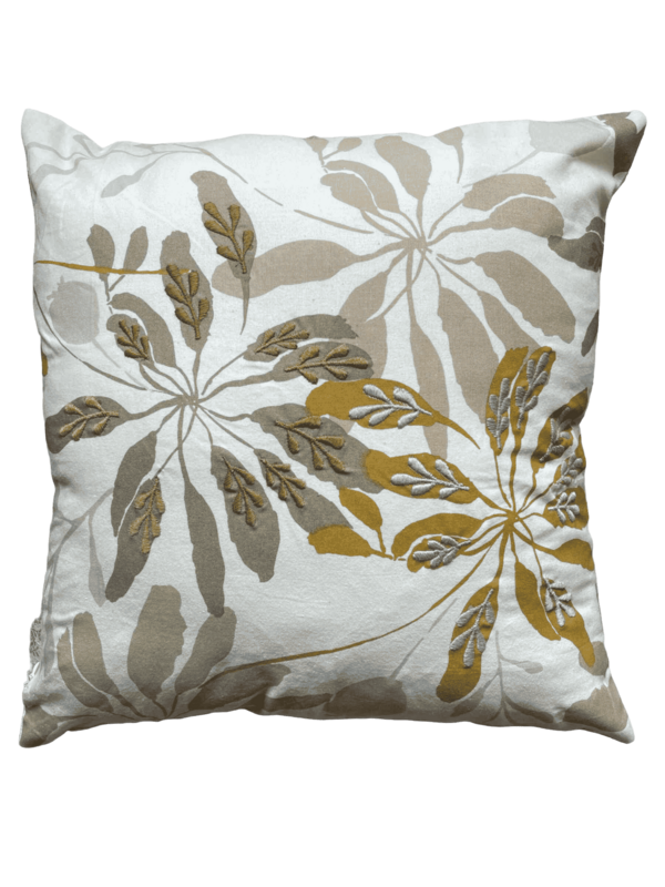Coussin beige motifs feuillage