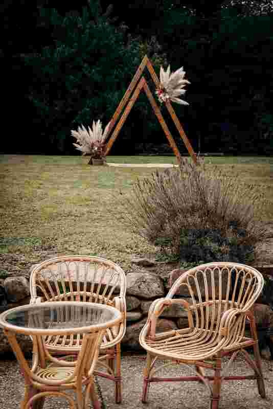 Fauteuil en rotin naturel clair liseré