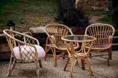 Table basse rotin ronde plateau verre