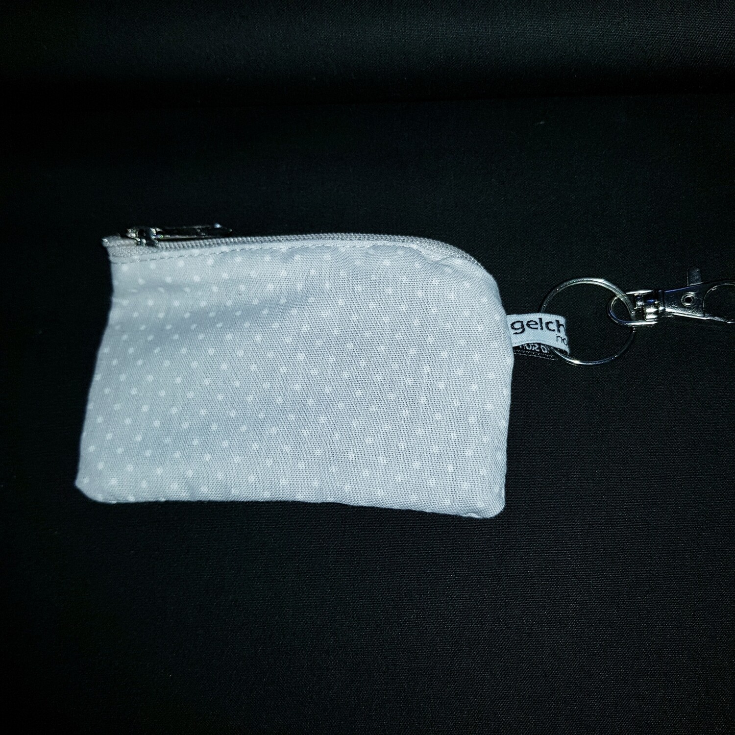 Schlüsselanhänger EC grau weiss gepunktet Schlüsselanhänger EC grau weiss gepunktet