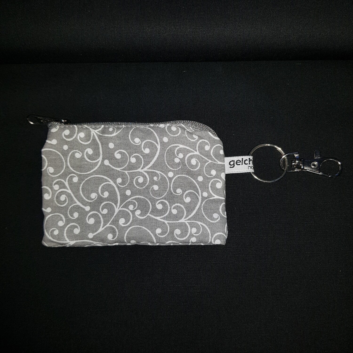 Schlüsselanhänger EC grau Ornament