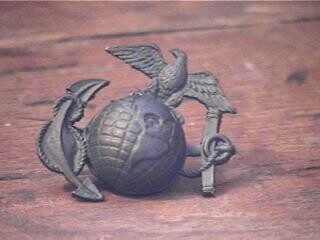 WWI Marine Corps. Sitting EGA (Eagle Globe and Anchor)