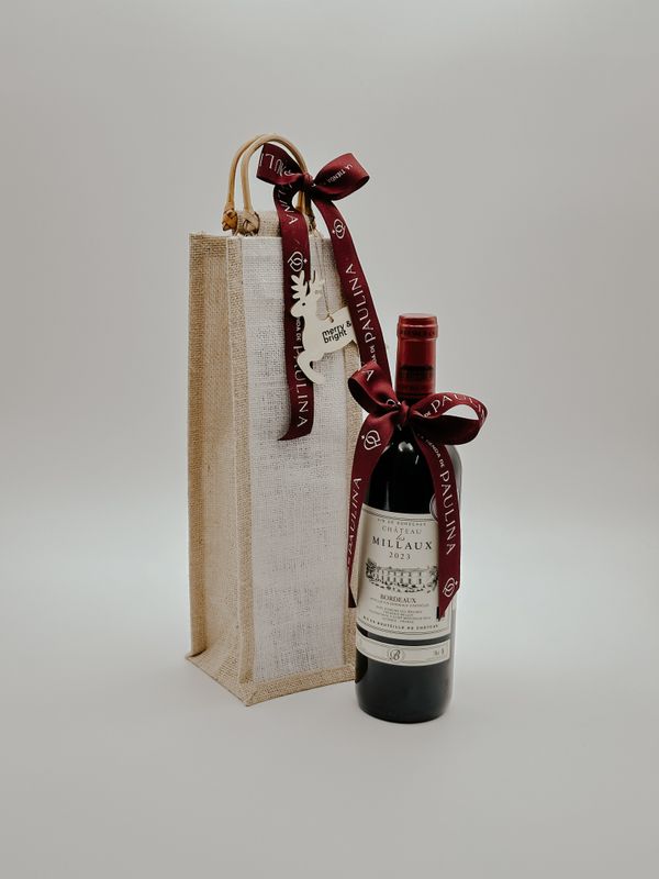 Botella de vino en bolsa de yute