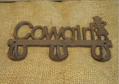 CAST IRON COWGIRL COAT RACK CAST IRON COWGIRL COAT RACK