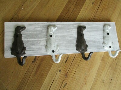 4 DOG TAIL HOOKS ON DISTRESSED WOOD 4 DOG TAIL HOOKS ON DISTRESSED WOOD