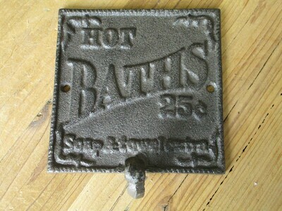 CAST IRON HOT BATHS 25 CENTS SIGN AND HOOK CAST IRON HOT BATHS 25 CENTS SIGN AND HOOK