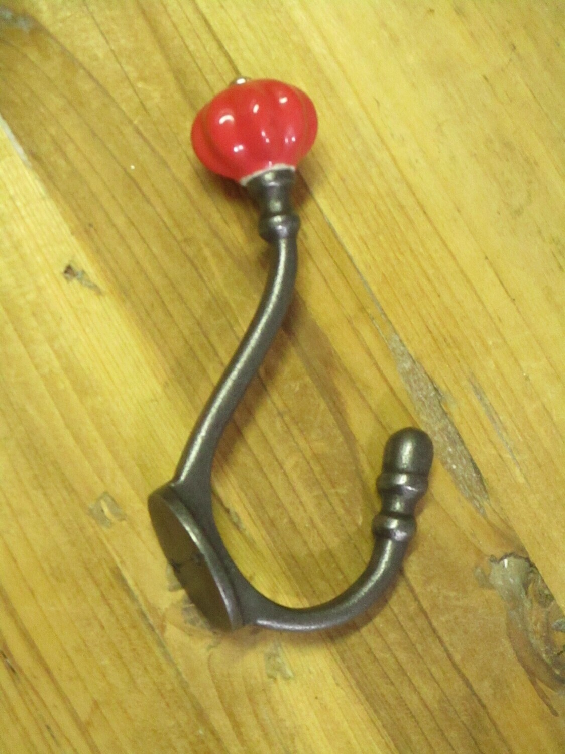 CAST IRON PUMPKIN STYLE HOOK - RED COLORED KNOB