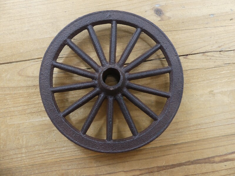SMALL RUSTIC CAST IRON WAGON WHEEL,  6 3/4" DIAMETER