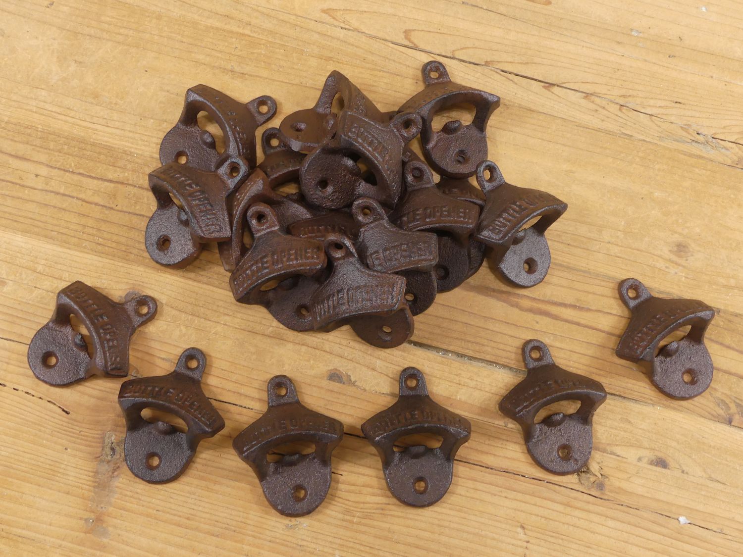 CAST IRON OPENER / EACH READS CAST IRON OPENER / EACH READS "BOTTLE OPENER"