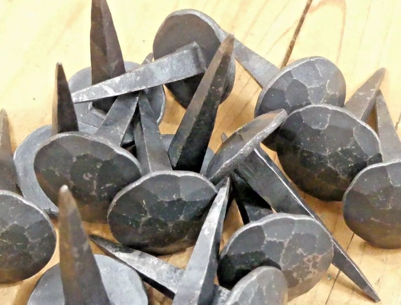 BLACK HAND FORGED IRON DENTED CLAVOS, 1 1/8" WIDE WITH  2" NAIL
