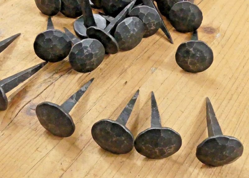 BLACK HAND FORGED IRON DENTED CLAVOS, 1 1/8" WIDE WITH  2" NAIL