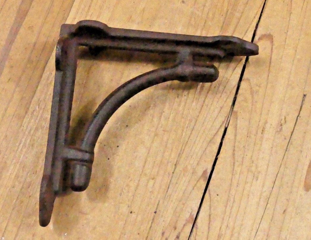 SMALL CAST IRON BRACKETS,  4 3/8" X 4 3/8"
