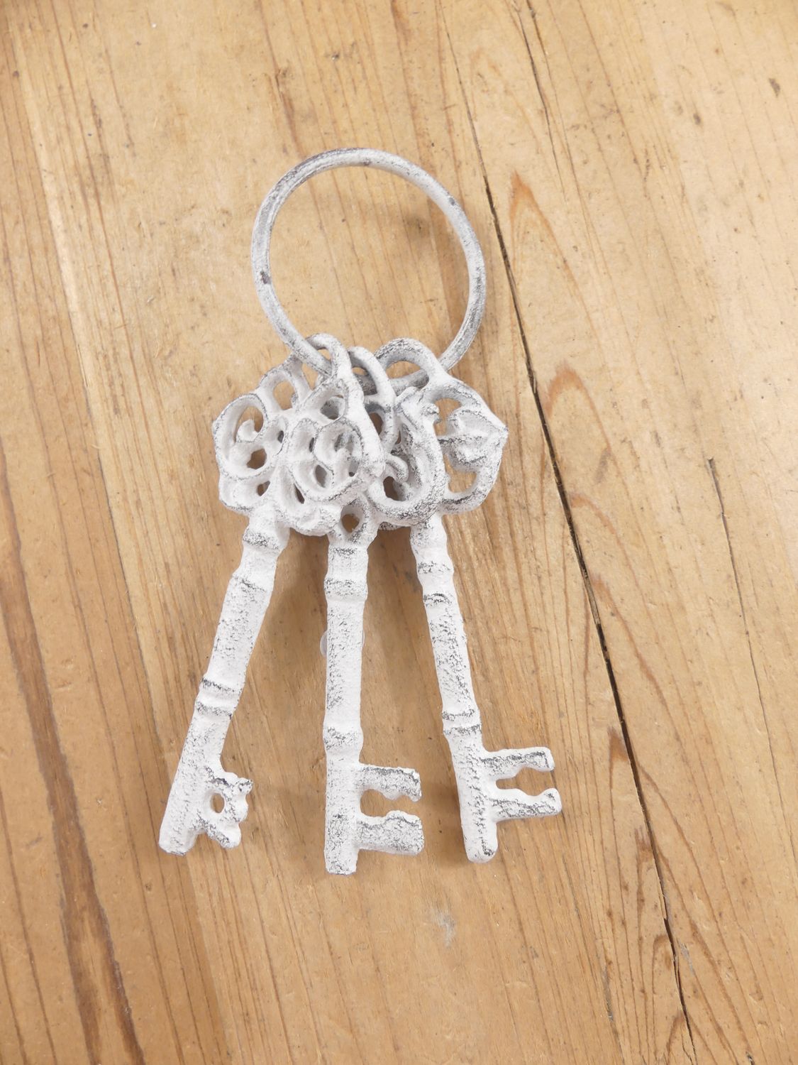 3 DISTRESSED WHITE SKELETON KEYS ON RING