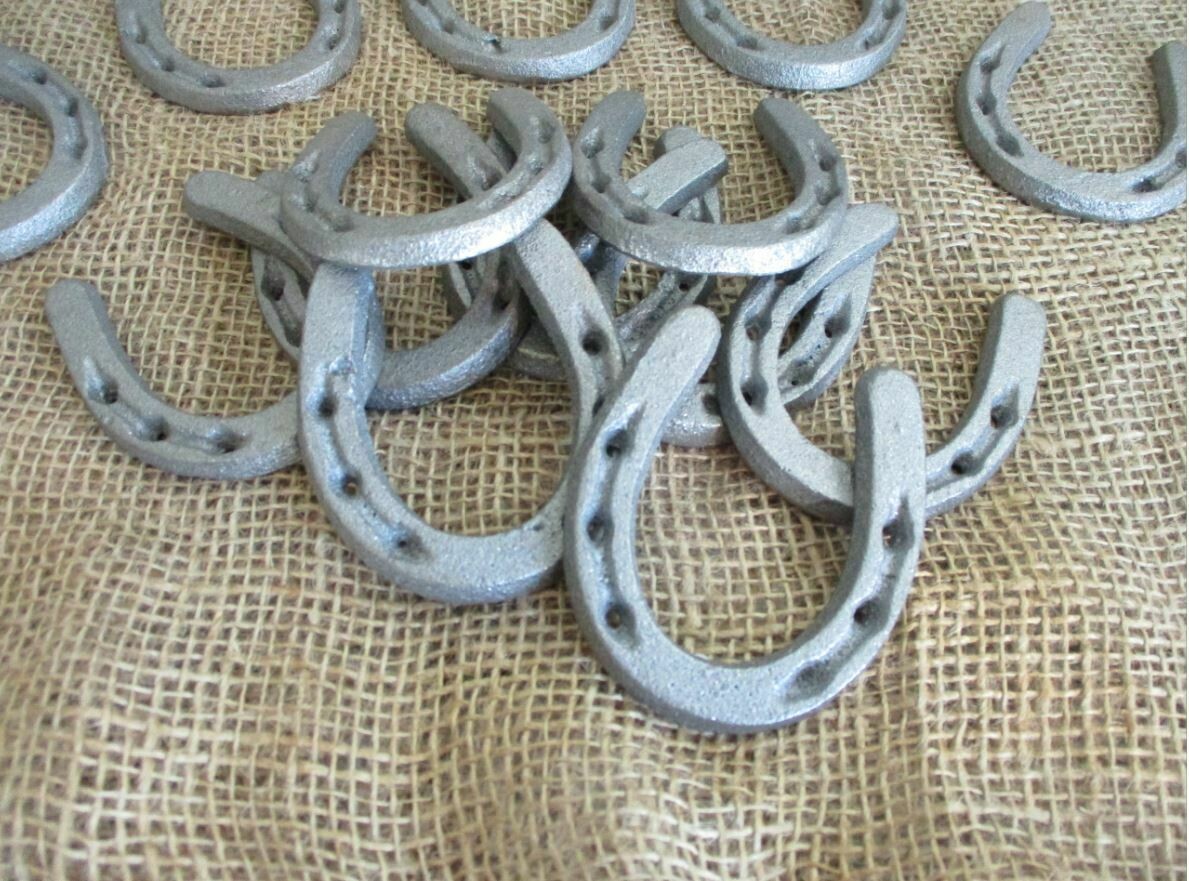 MEDIUM CAST IRON HORSESHOES,  3 1/2" X 2 3/4"