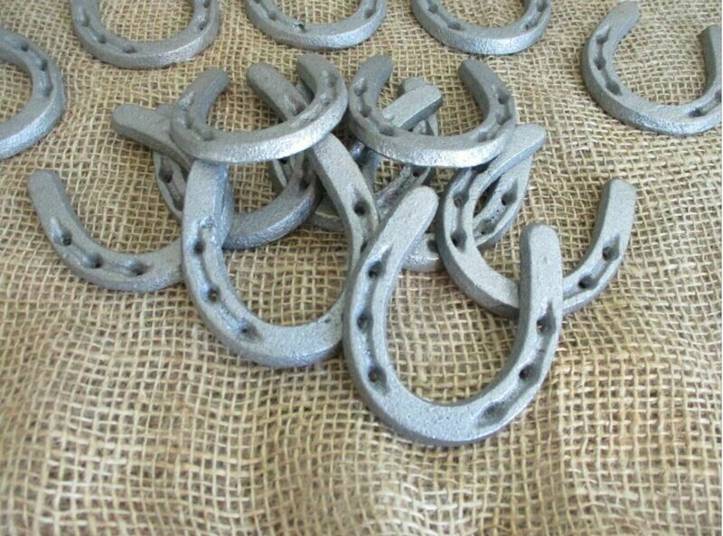 MEDIUM CAST IRON HORSESHOES,  3 1/2" X 2 3/4"
