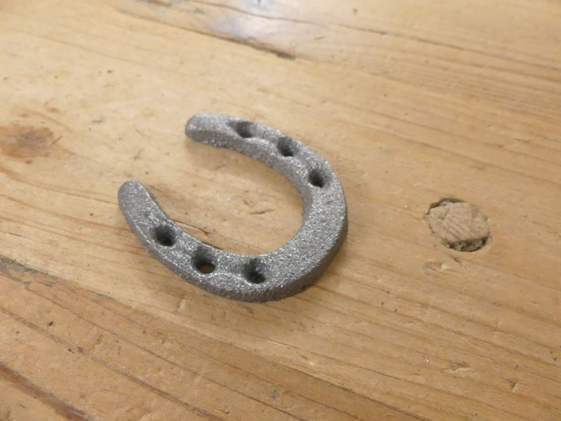 SMALL CAST IRON HORSESHOES , 2" LONG