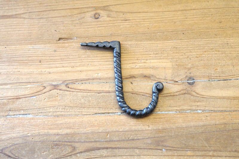 HAND FORGED NAIL IN HOOK,  3 1/2" LONG