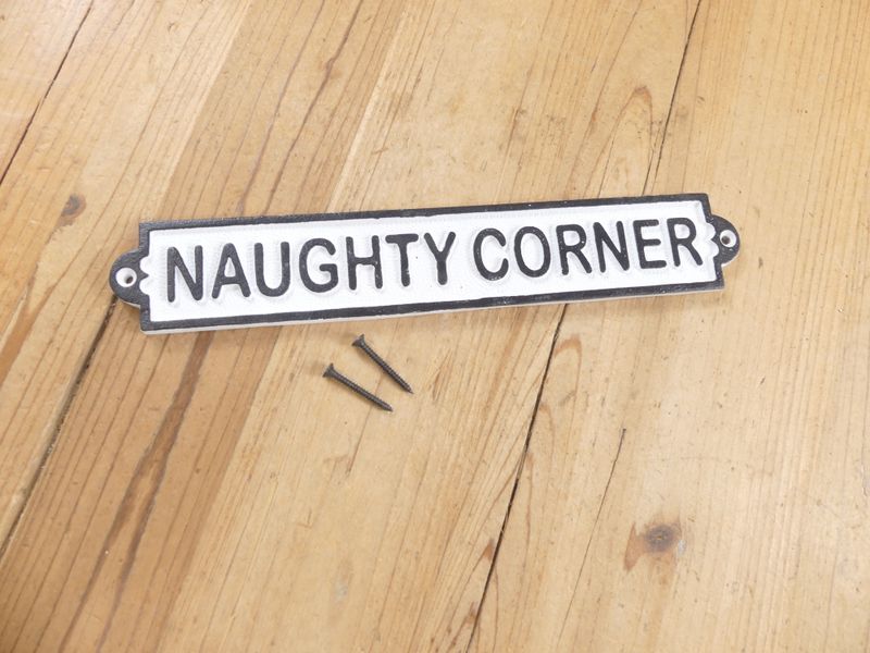 CAST IRON "NAUGHTY CORNER" SIGN