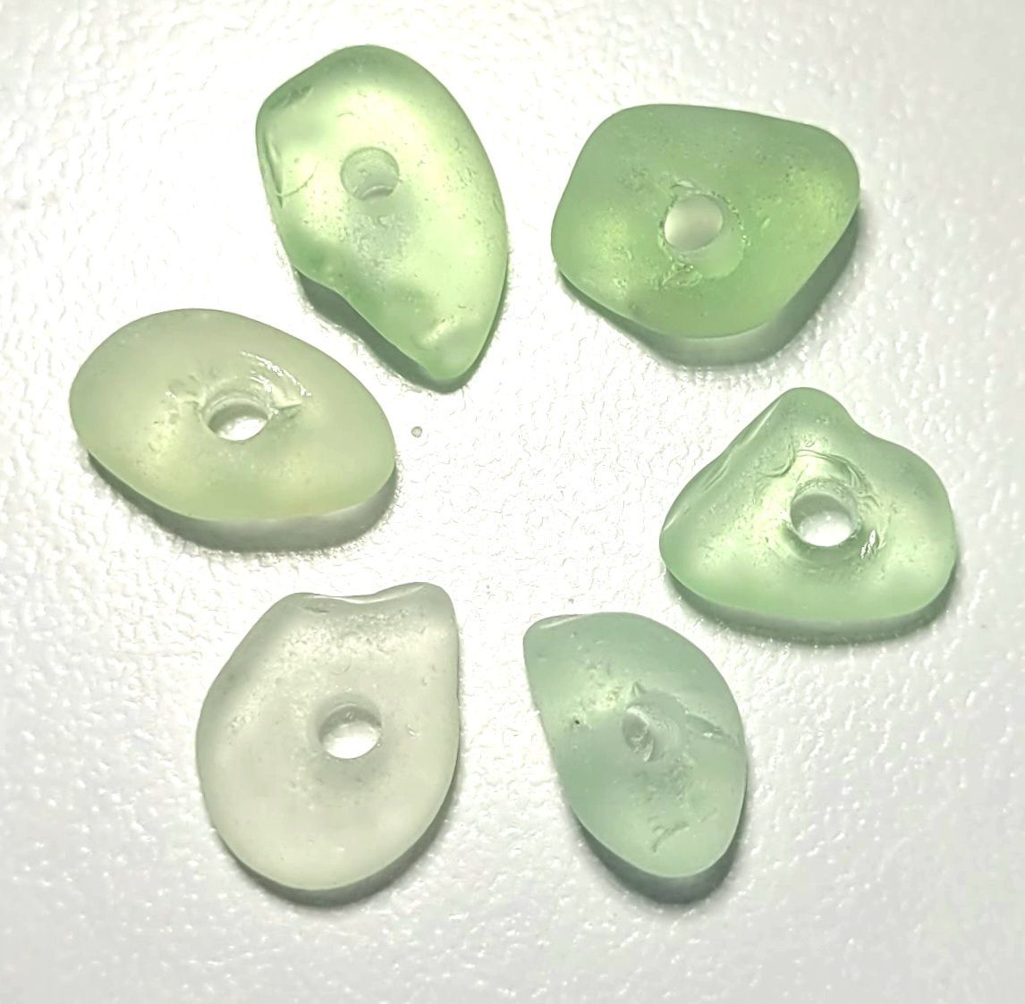 Glowing Drilled UV Lime - 6pcs Glowing Drilled UV Lime - 6pcs