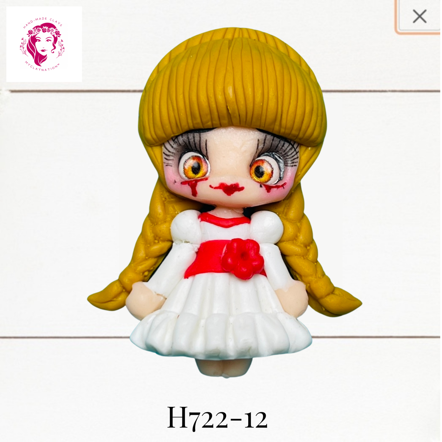 H722-12: Halloween Clay Bow Center