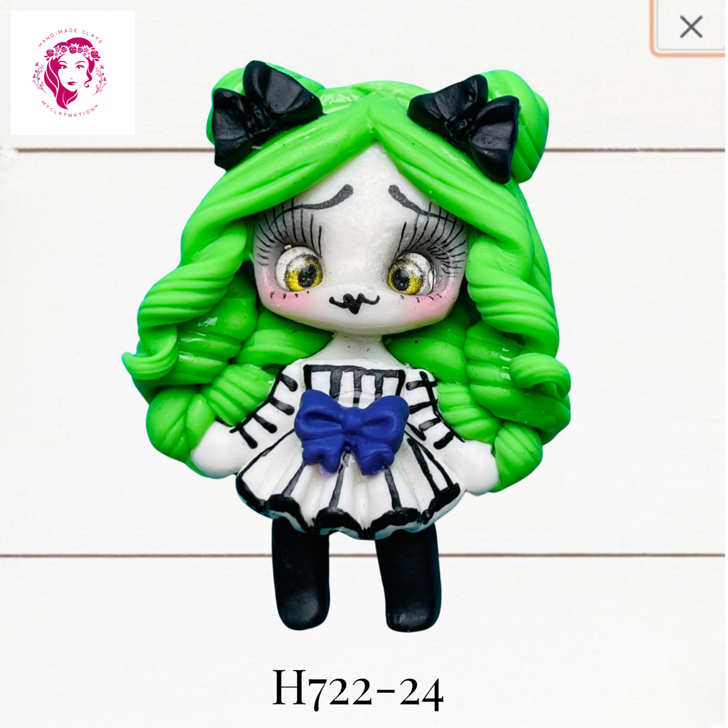 H722-24: Halloween Clay Bow Center