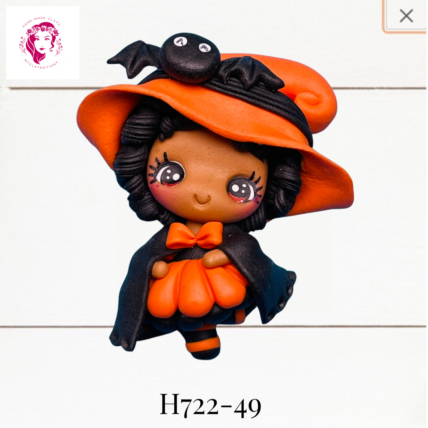 H722-49: Halloween Clay Bow Center