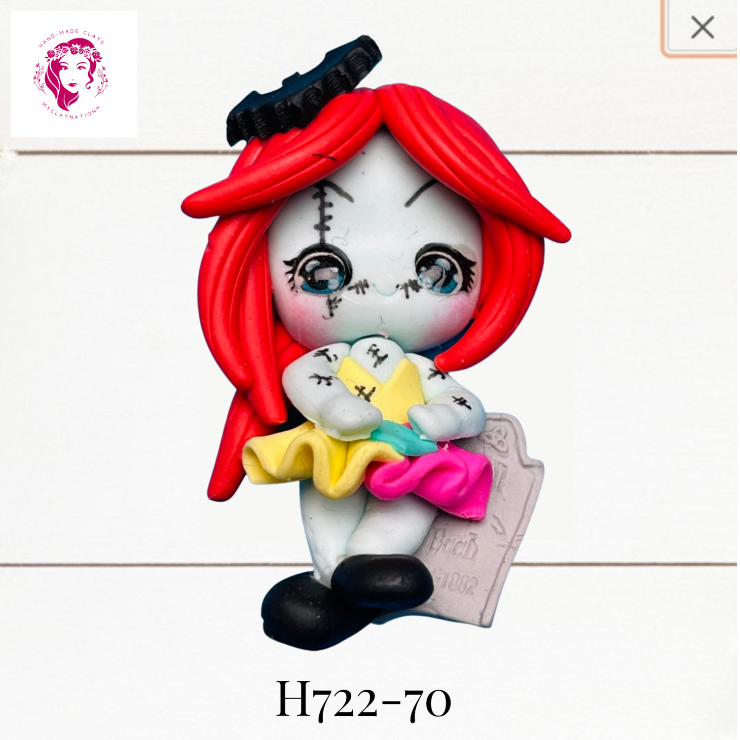 H722-70: Halloween Clay Bow Center