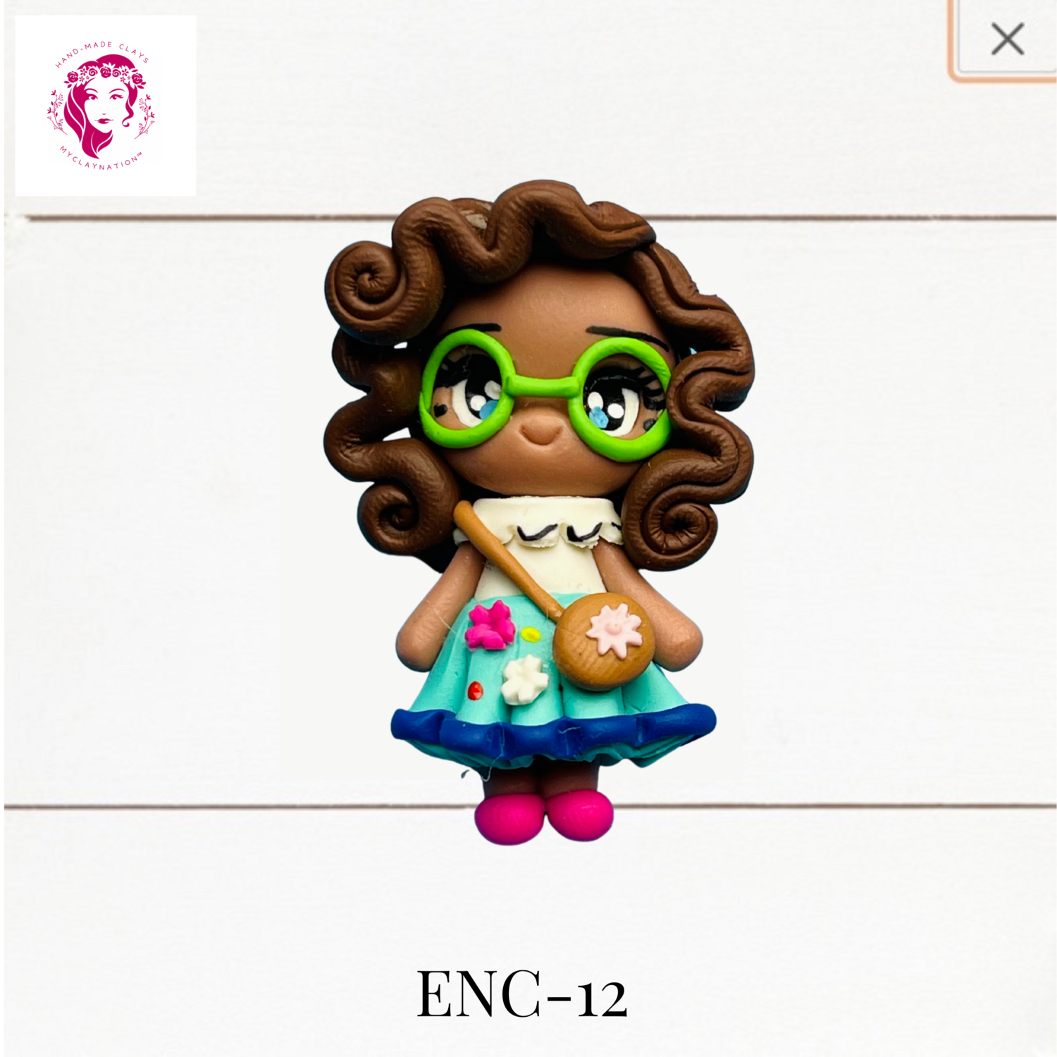 ENC-12: Encanto Inspired Clay Bow Center