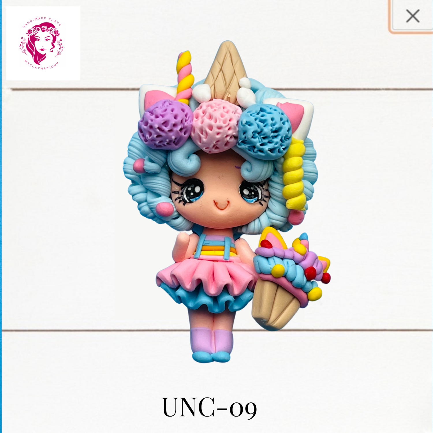 Unicorn Girl Clay Hairbow Center in a Pink Skirt -UNC-09