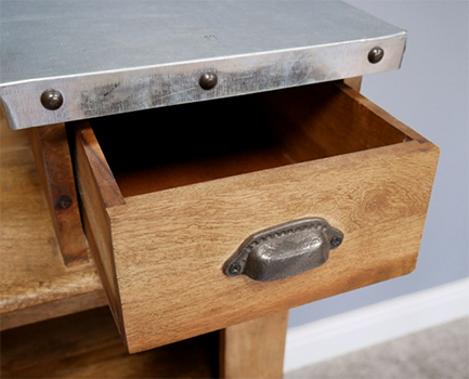 The Delroy is a functional bar counter built to withstand good use. Here you can see one of the two drawers that are perfect for bar accessories, and the heavy quality counter top.