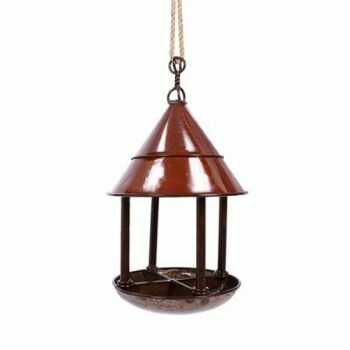 Well, there's bird feeders and now there's something much more spectacular for them to eat from and for you to treasure! The Bird Cafe sculpture brings bird feeding to a new level.