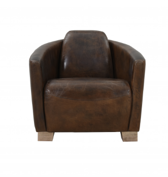 The Churchill Cigar Chair is covered in Brazilian leather in a cognac finish. Its roundish shape is decidedly comfortable.