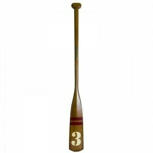 A distinctive oar, made in mahogany, with a number 3 on the oar blade.