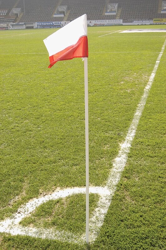 precision Corner Post on pitch in white and red finish