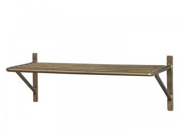 An iron shelf finished in Antique Brass.