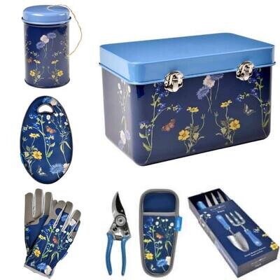 RHS British Meadow Bundle Collection Offer Burgon & Ball RHS Meadow Seed Storage Tin, Kneeler, Twine in a Tin, Gardening Gloves, Gardening Hand Trowel and Fork Set and Pruner and Holster Set.
Blue colourway with meadow flowers and butterflies design.