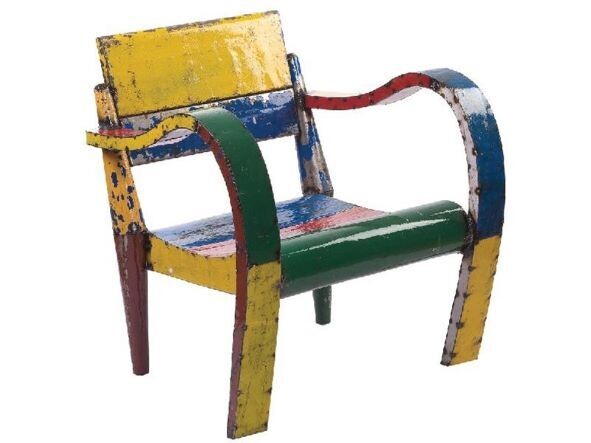 The Low Lounger Chair is strangely comfy, and made of recycled metals. It is finished in a highly lacquered hand painted colouring. Suitable both indoors and outside.