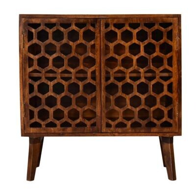 Made from solid Mango wood, this honeycomb design cabinet is finished in a chestnut stain and has two opening doors.
