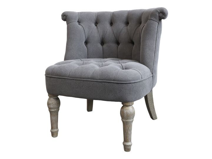 A beautifully shaped comfortable armchair in a tasteful grey linen fabric