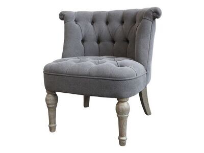 A beautifully shaped comfortable armchair in a tasteful grey linen fabric