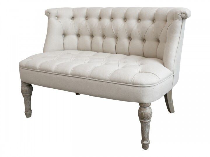 A very grand look to this Alize sofa in a pretty French style. Made from Oak wood and with its buttoned linen fabric finishing, this 2-seater sofa looks quite regal. 