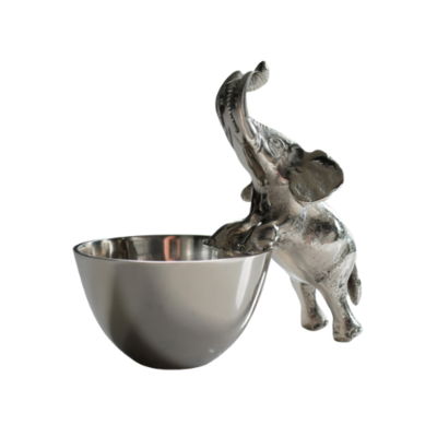 An aluminium bowl with a standing elephant 