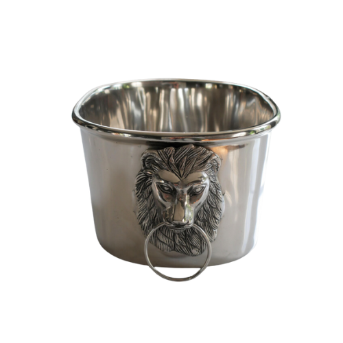 An ice bucket/ chiller with a beautiful lion head handle.