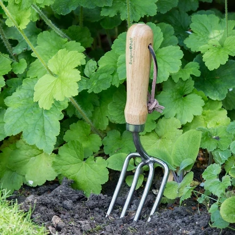 Garden Hand Folk - round tined prongs - set in garden border