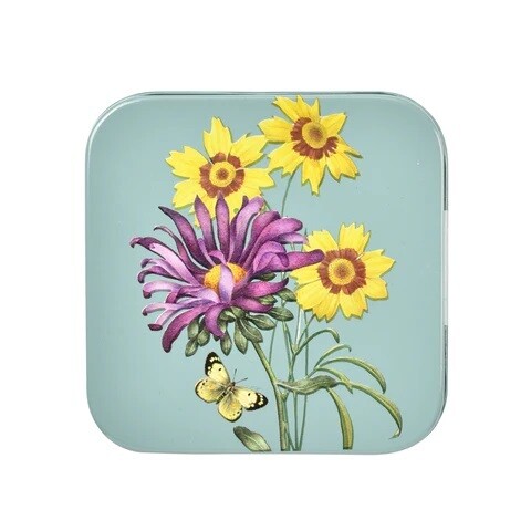 Asteraceae Design. Light Duck Egg Blue with three yellow flowers and one purple flower design.
Image of the Lid featuring this design.