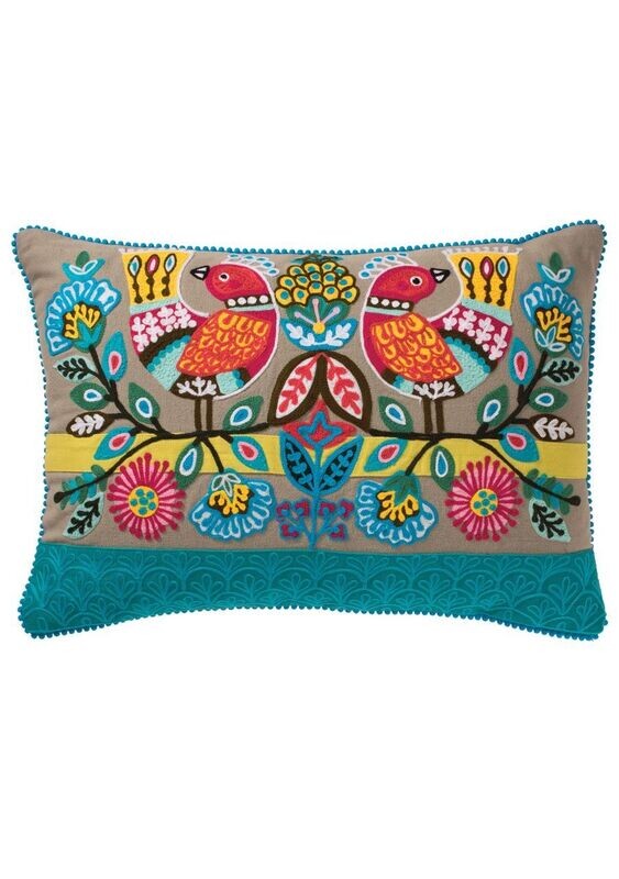 A pretty embroidered bird design in a rectangular shape