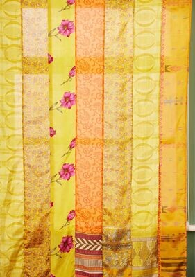 Our sari-styled curtain panels come in these sunshine yellow hues