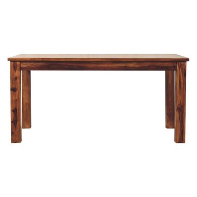 A clean lines dining table in a caramel chestnut finish made of solid Sheesham wood