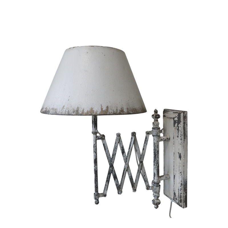 What could be more useful? This wall lamp extends at a gentle touch to redirect your light to a required position.