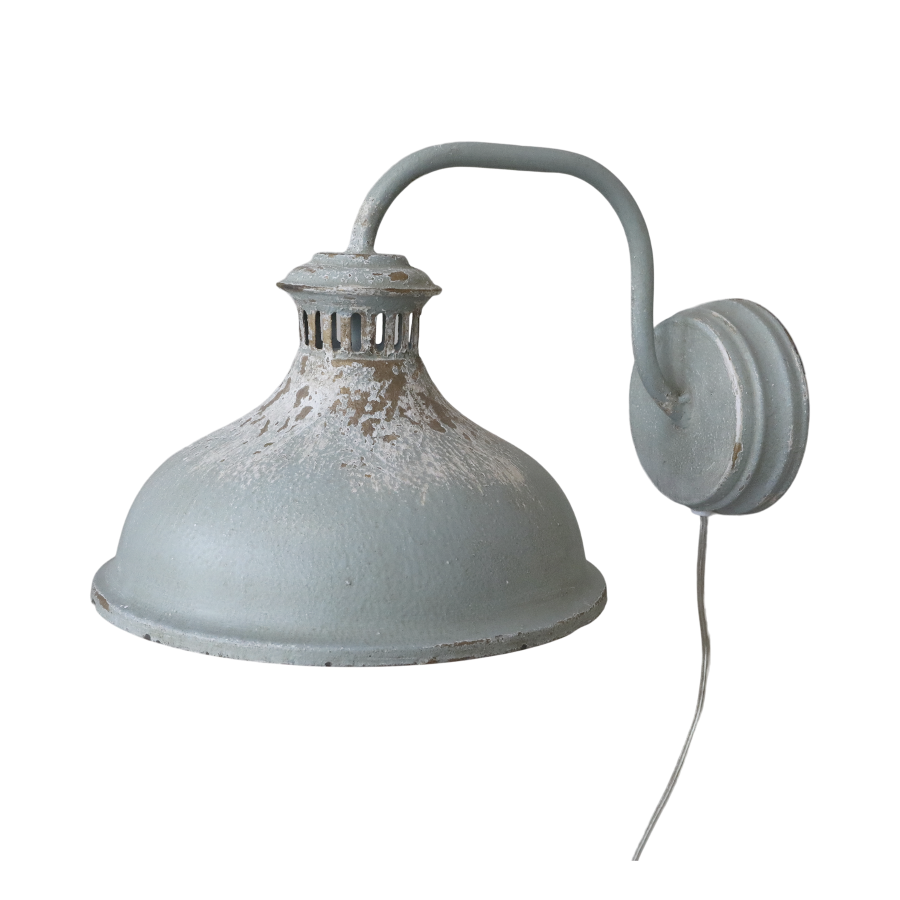 The Opal Wall Lamp is made in iron and this Antique Opal finish gives it a touch of class
